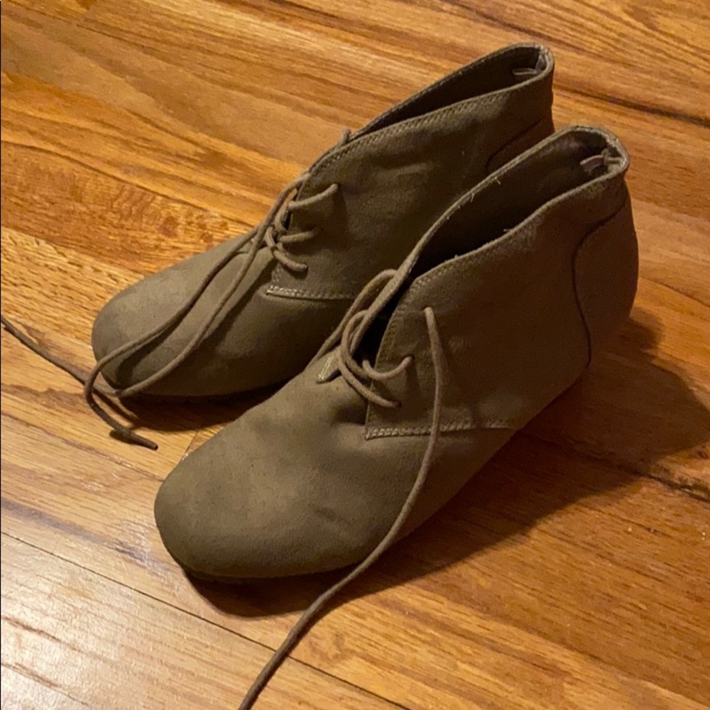 Tan wedge booties.